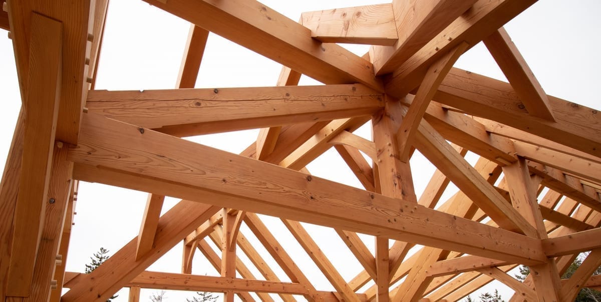 View of timber frame truss cross cable in kiln-dried douglas-fir