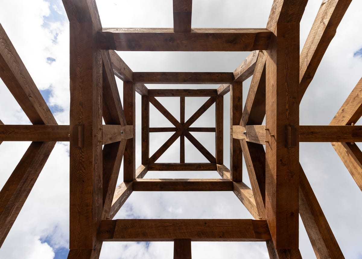 ornate timber frame hip roof cupola