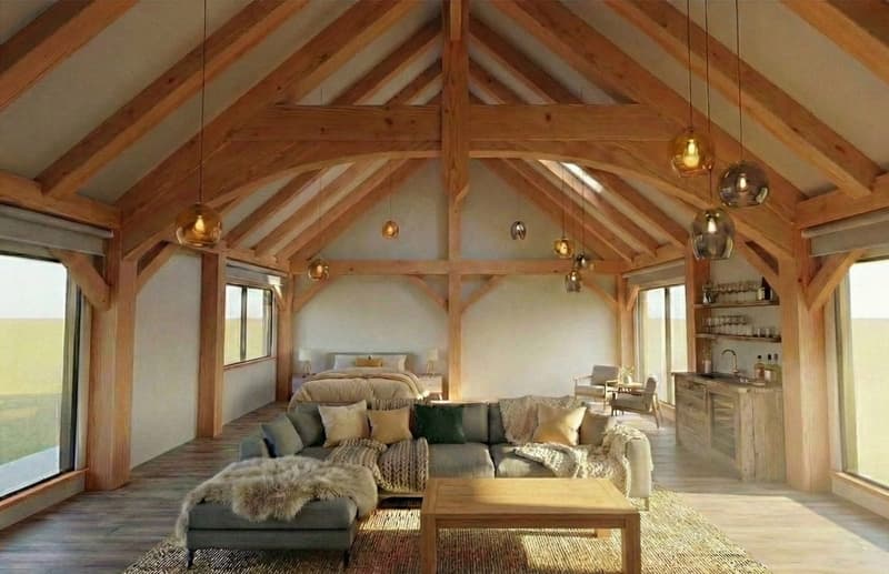 Arch truss timber frame with second-floor loft and exposed joinery